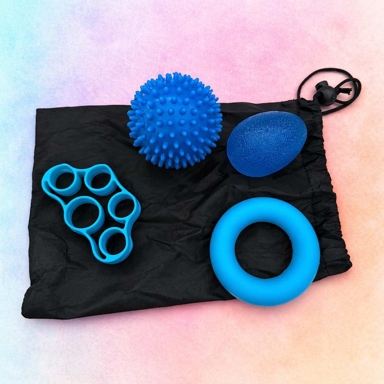 Blue sensory fidget bundle displayed in black drawstring bag with multiple calming toys