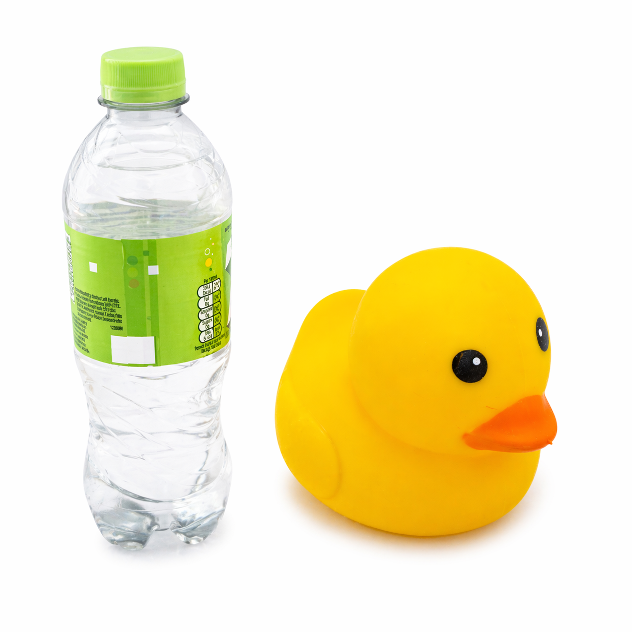 Yellow squishy duck next to water bottle showing size comparison