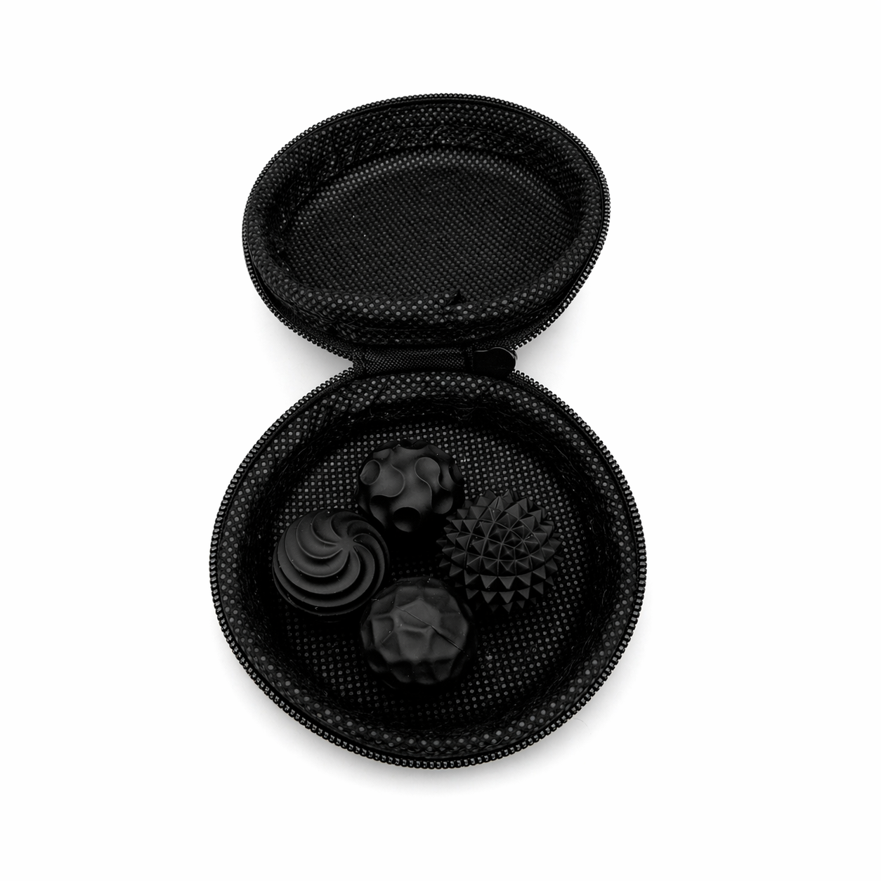 Black textured magnetic sensory balls inside an open zip storage case, compact sensory fidget set