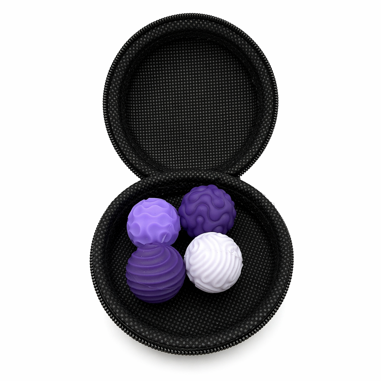 Purple and white textured magnetic sensory balls inside an open storage case, tactile sensory fidget set