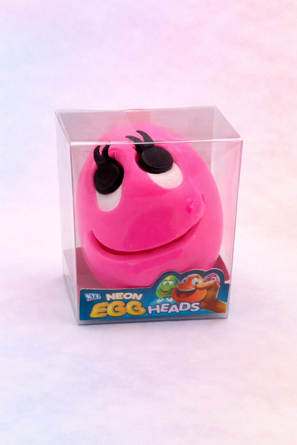 Pink Neon Egg Heads squishy fidget toy for stress relief and tactile sensory play